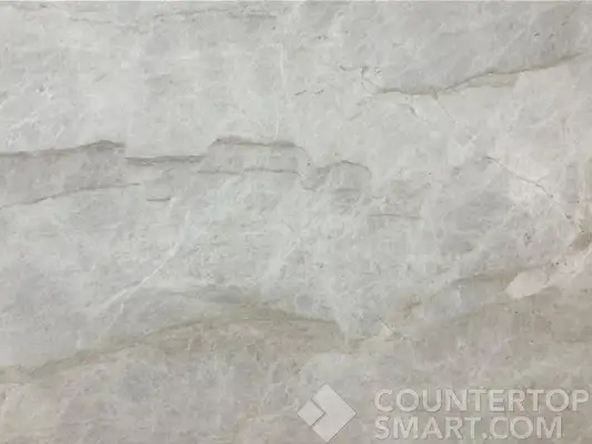 Closeup image of Perla Venato White Quartzite countertop slab